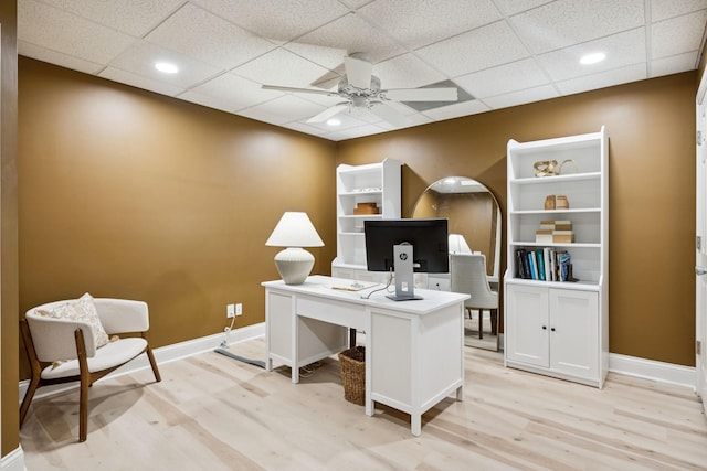 216 Bramerton Ct, Franklin, TN 37069 - home office featuring light wood-style floors, a ceiling fan, and a drop ceiling