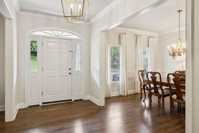 216 Bramerton Ct, Franklin, TN 37069 - foyer with a chandelier, dark wood-type flooring, and ornamental molding