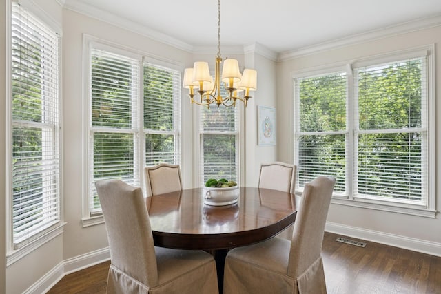 216 Bramerton Ct, Franklin, TN 37069 - dining room with a chandelier, plenty of natural light, dark wood finished floors, and crown molding