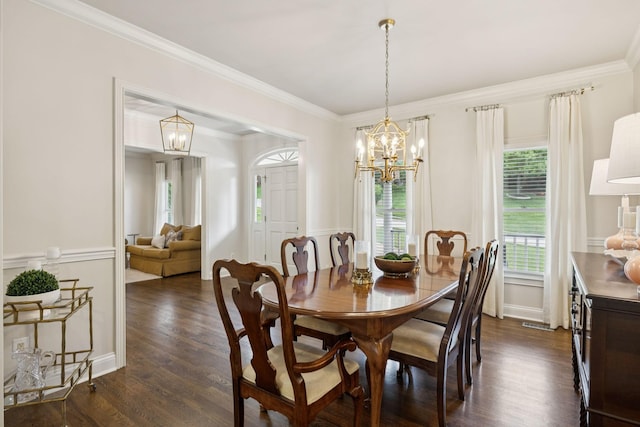 216 Bramerton Ct, Franklin, TN 37069 - dining area featuring a chandelier, dark wood finished floors, and ornamental molding