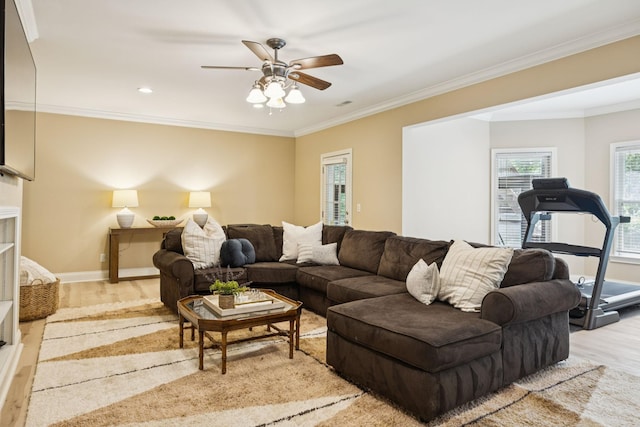 216 Bramerton Ct, Franklin, TN 37069 - living area featuring wood finished floors, ceiling fan, ornamental molding, and recessed lighting