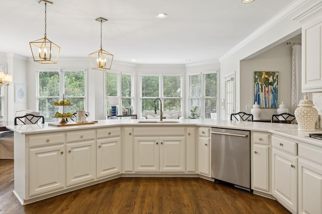 216 Bramerton Ct, Franklin, TN 37069 - kitchen featuring dishwasher, a chandelier, crown molding, dark wood-style flooring, and light countertops