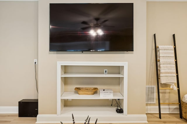 216 Bramerton Ct, Franklin, TN 37069 - detailed view of wood finished floors and ceiling fan