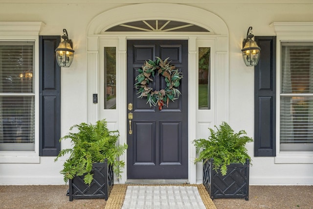 216 Bramerton Ct, Franklin, TN 37069 - view of exterior entry featuring a porch