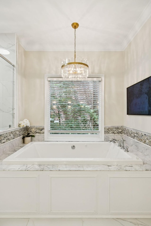 216 Bramerton Ct, Franklin, TN 37069 - bathroom with a chandelier, healthy amount of natural light, a garden tub, crown molding, and a marble finish shower