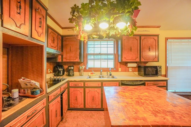 1094B Center Point Rd, Hendersonville, TN 37075 - kitchen with black appliances, ornamental molding, under cabinet range hood, brown cabinetry, and a chandelier