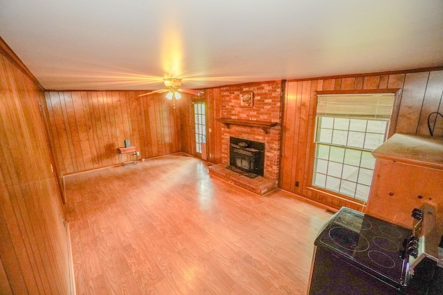 1094B Center Point Rd, Hendersonville, TN 37075 - living room with a ceiling fan, wood walls, wood finished floors, crown molding, and a brick fireplace