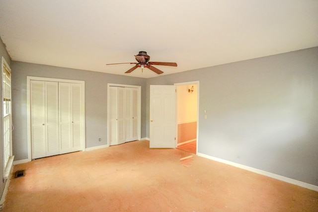 1094B Center Point Rd, Hendersonville, TN 37075 - unfurnished bedroom featuring multiple closets and a ceiling fan