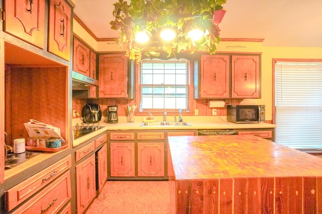 1094B Center Point Rd, Hendersonville, TN 37075 - kitchen with black appliances, light countertops, ornamental molding, a chandelier, and under cabinet range hood