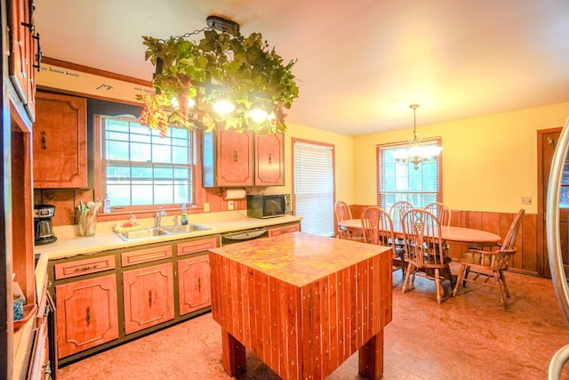 1094B Center Point Rd, Hendersonville, TN 37075 - kitchen with a chandelier, black microwave, plenty of natural light, a wainscoted wall, and decorative light fixtures