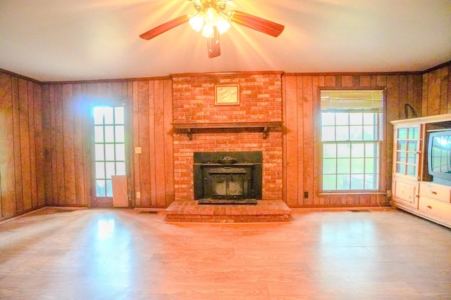 1094B Center Point Rd, Hendersonville, TN 37075 - unfurnished living room with wood finished floors, wooden walls, healthy amount of natural light, ceiling fan, and crown molding