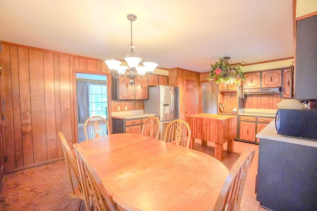 1094B Center Point Rd, Hendersonville, TN 37075 - dining space with wood walls and a chandelier