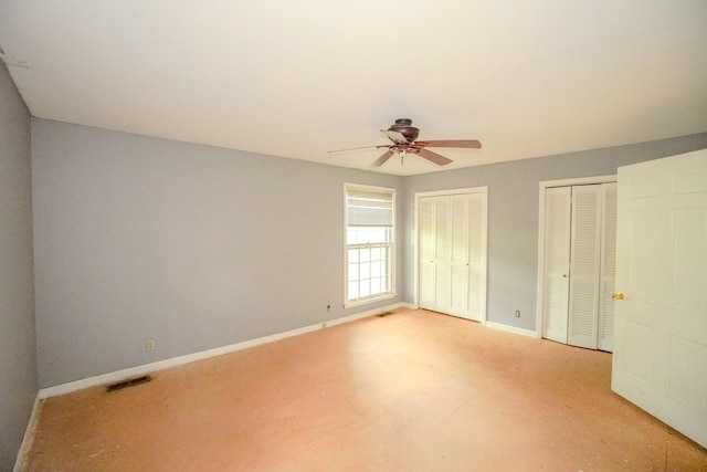 1094B Center Point Rd, Hendersonville, TN 37075 - unfurnished bedroom featuring multiple closets and a ceiling fan