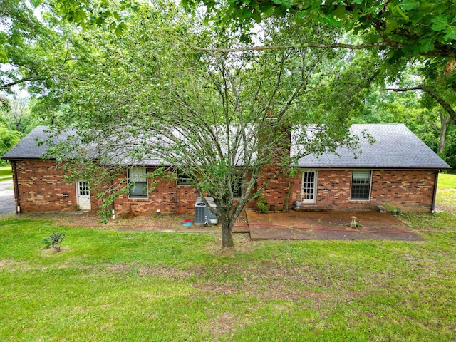 1094B Center Point Rd, Hendersonville, TN 37075 - rear view of house featuring a patio, a lawn, a shingled roof, and brick siding