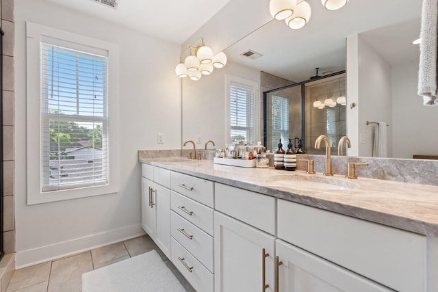 1708A 7th Ave N, Nashville, TN 37208 - full bath featuring double vanity, a shower stall, and tile patterned floors