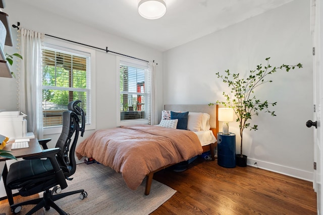 1708A 7th Ave N, Nashville, TN 37208 - bedroom featuring wood finished floors and an office area