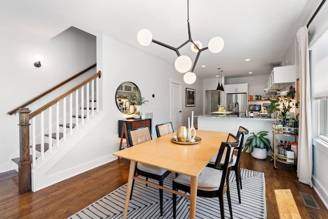 1708A 7th Ave N, Nashville, TN 37208 - dining area featuring dark wood-style floors, stairs, and recessed lighting