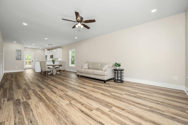 223 Patriot Ln, Estill Springs, TN 37330 - living area with electric panel, wood finished floors, a ceiling fan, and recessed lighting