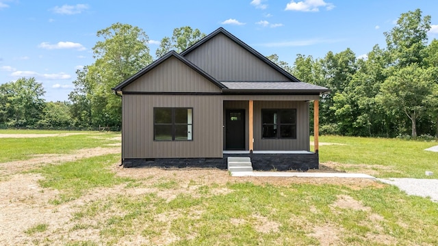 223 Patriot Ln, Estill Springs, TN 37330 - view of front of home with a front yard, crawl space, and a porch