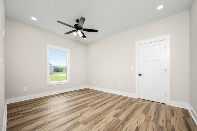 223 Patriot Ln, Estill Springs, TN 37330 - spare room featuring wood finished floors, ceiling fan, and recessed lighting