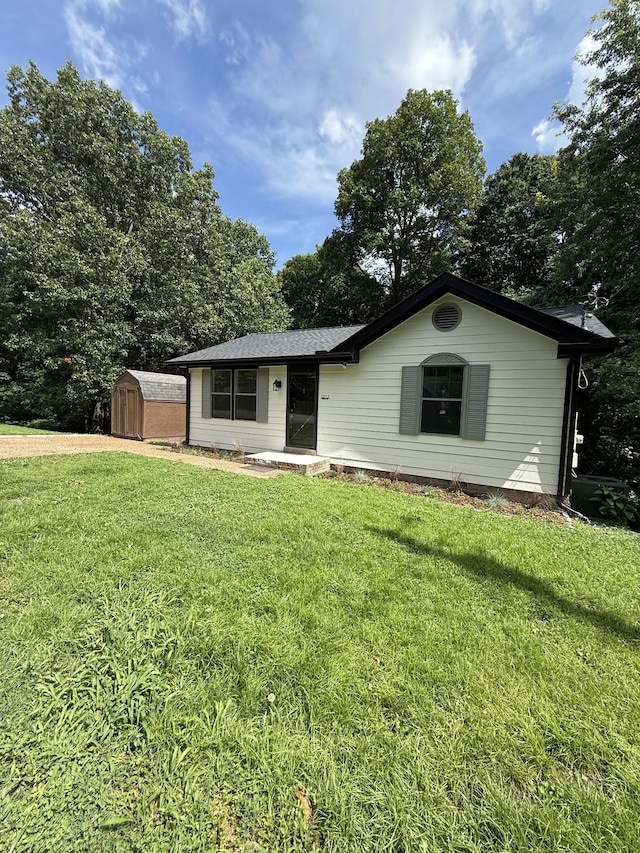 1012 Hollis Ln, White House, TN 37188 - single story home with a shed and a front yard