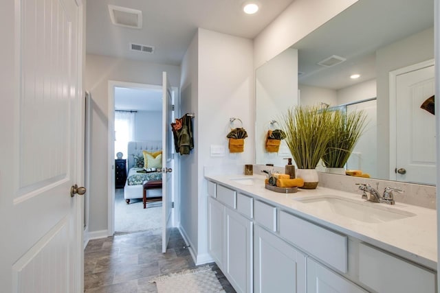 1752 Wren Way, Lebanon, TN 37087 - full bath with double vanity, ensuite bath, a shower, and stone finish flooring