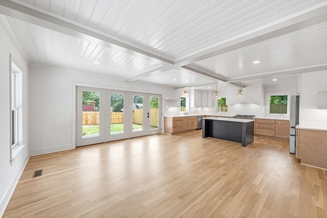 1516 Forest Ave, Nashville, TN 37206 - kitchen with light countertops, light wood-type flooring, dishwasher, open floor plan, and recessed lighting