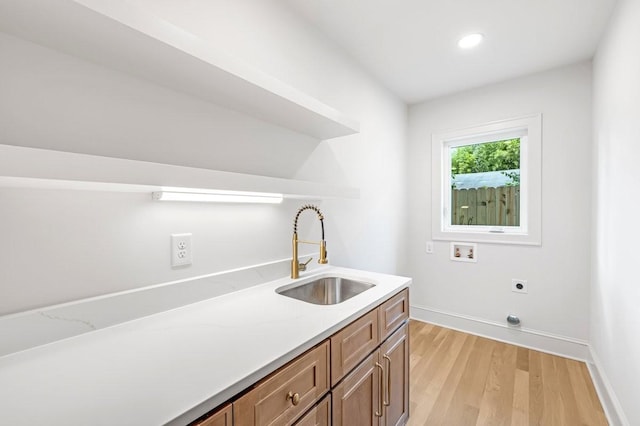 1516 Forest Ave, Nashville, TN 37206 - washroom featuring electric dryer hookup, hookup for a washing machine, cabinet space, light wood-style flooring, and recessed lighting