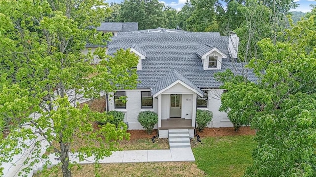 1516 Forest Ave, Nashville, TN 37206 - view of front of property with a chimney, roof with shingles, and a front yard