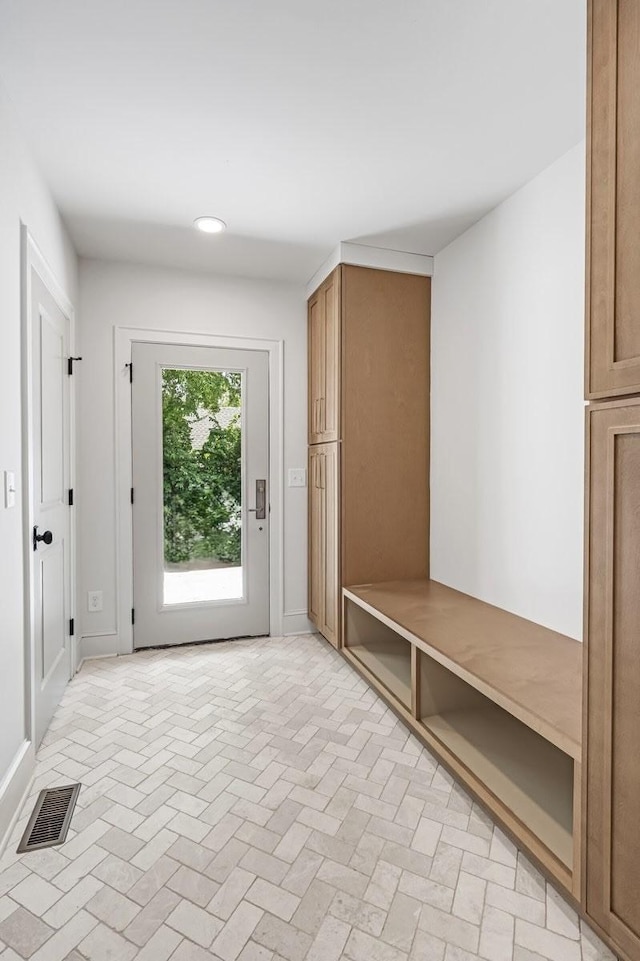 1516 Forest Ave, Nashville, TN 37206 - mudroom with brick patterned floors and recessed lighting