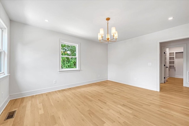 1516 Forest Ave, Nashville, TN 37206 - unfurnished room featuring light wood finished floors, a chandelier, and recessed lighting