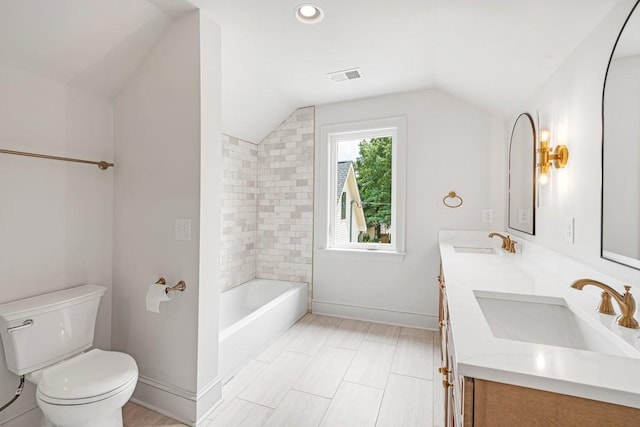 1516 Forest Ave, Nashville, TN 37206 - bathroom with vaulted ceiling, double vanity, and  shower combination