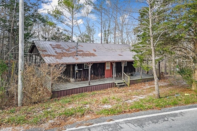 7769 Willow Grove Hwy, Allons, TN 38541 - view of front of home featuring a metal roof and board and batten siding
