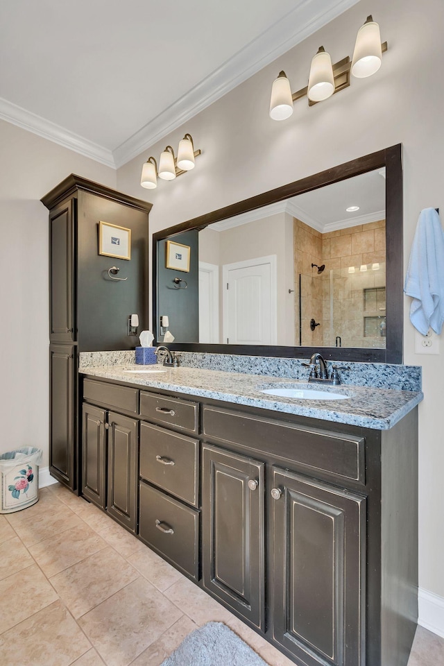 4313 Glasgow Rd, Spring Hill, TN 37174 - bathroom featuring double vanity, tiled shower, crown molding, and tile patterned floors