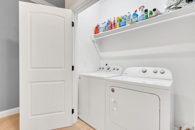 4313 Glasgow Rd, Spring Hill, TN 37174 - washroom with washing machine and clothes dryer and baseboards