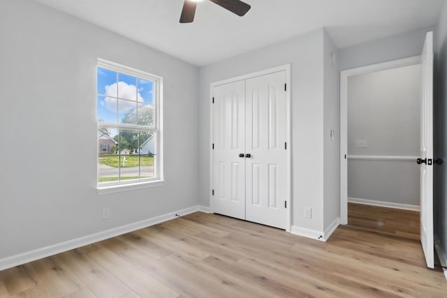 2717 Cayuga Dr, Murfreesboro, TN 37130 - unfurnished bedroom featuring light wood finished floors, a closet, and a ceiling fan