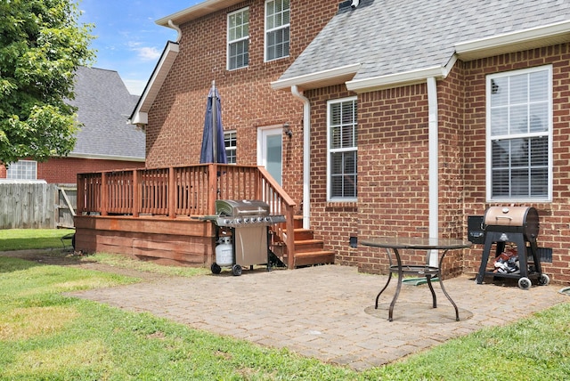 2507 Patricia Cir, Murfreesboro, TN 37128 - back of house with brick siding, roof with shingles, a wooden deck, and a patio area