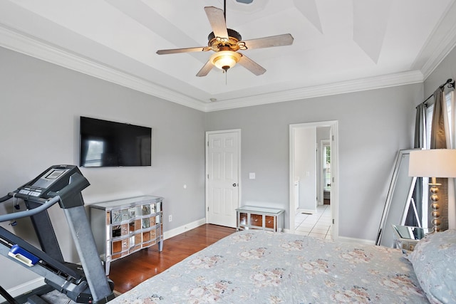 2507 Patricia Cir, Murfreesboro, TN 37128 - bedroom featuring a raised ceiling, crown molding, wood finished floors, and a ceiling fan