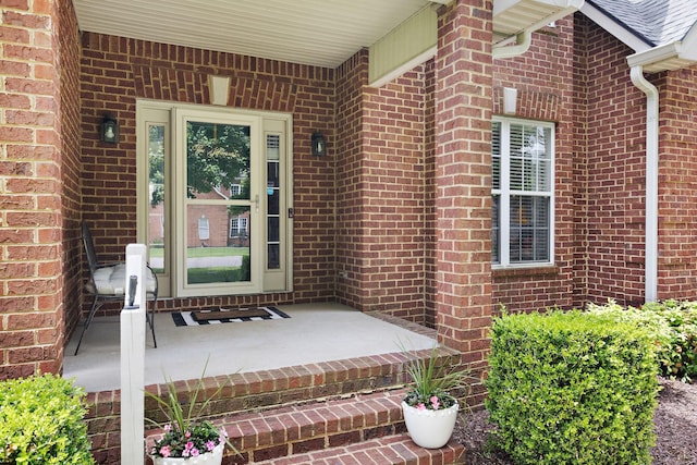 2507 Patricia Cir, Murfreesboro, TN 37128 - view of exterior entry featuring brick siding, covered porch, and roof with shingles