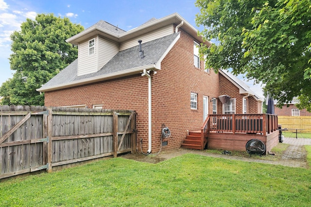 2507 Patricia Cir, Murfreesboro, TN 37128 - rear view of house with brick siding, a fenced backyard, a deck, and roof with shingles