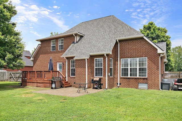 2507 Patricia Cir, Murfreesboro, TN 37128 - rear view of house with a patio area, brick siding, a wooden deck, and a shingled roof