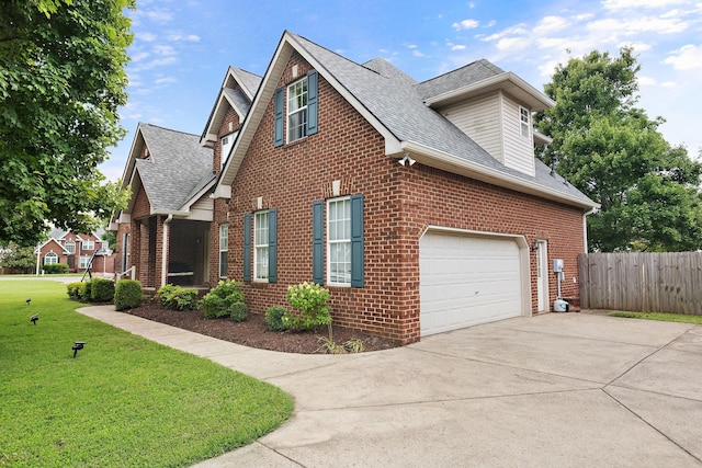 2507 Patricia Cir, Murfreesboro, TN 37128 - view of property exterior with brick siding, driveway, a shingled roof, and an attached garage