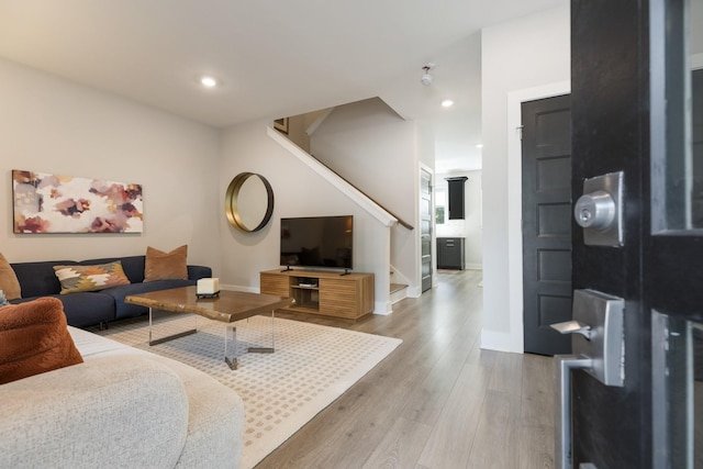801 Cherokee Ave Apt 6, Nashville, TN 37207 - living room featuring stairs, light wood finished floors, and recessed lighting