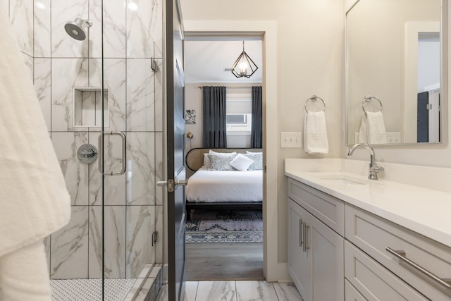 801 Cherokee Ave Apt 6, Nashville, TN 37207 - ensuite bathroom featuring marble finish floors, vanity, and a marble finish shower