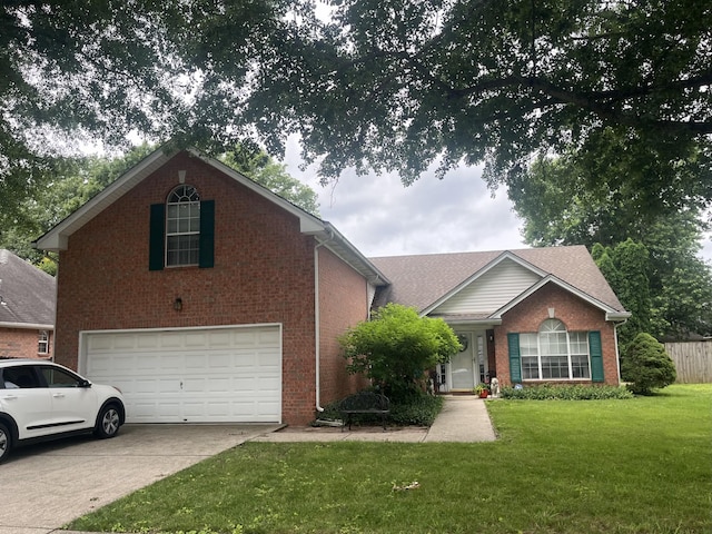 310 Park Glen Dr, Mount Juliet, TN 37122 - view of front of home with a garage, brick siding, and concrete driveway