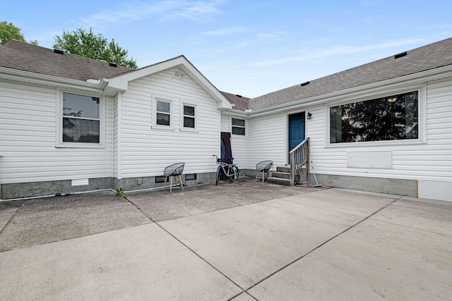 411 Lake Farm Rd, Smyrna, TN 37167 - back of property with entry steps, a patio, and roof with shingles