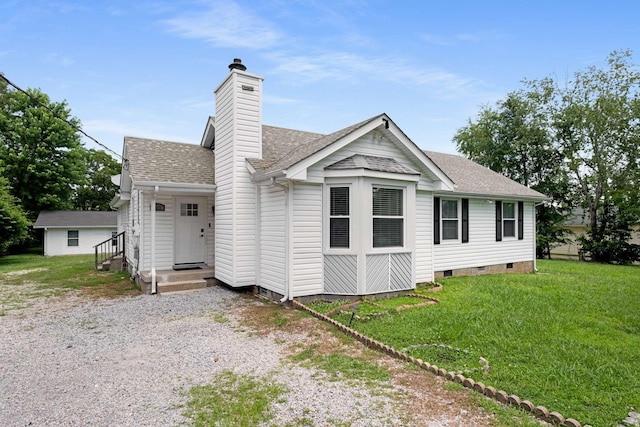 411 Lake Farm Rd, Smyrna, TN 37167 - back of property featuring a shingled roof, a chimney, a lawn, and crawl space