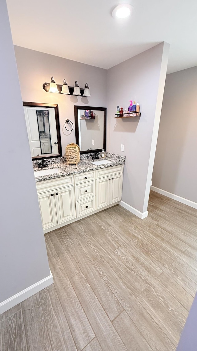 899 Sneed Blvd, Lafayette, TN 37083 - bathroom featuring wood finished floors and double vanity