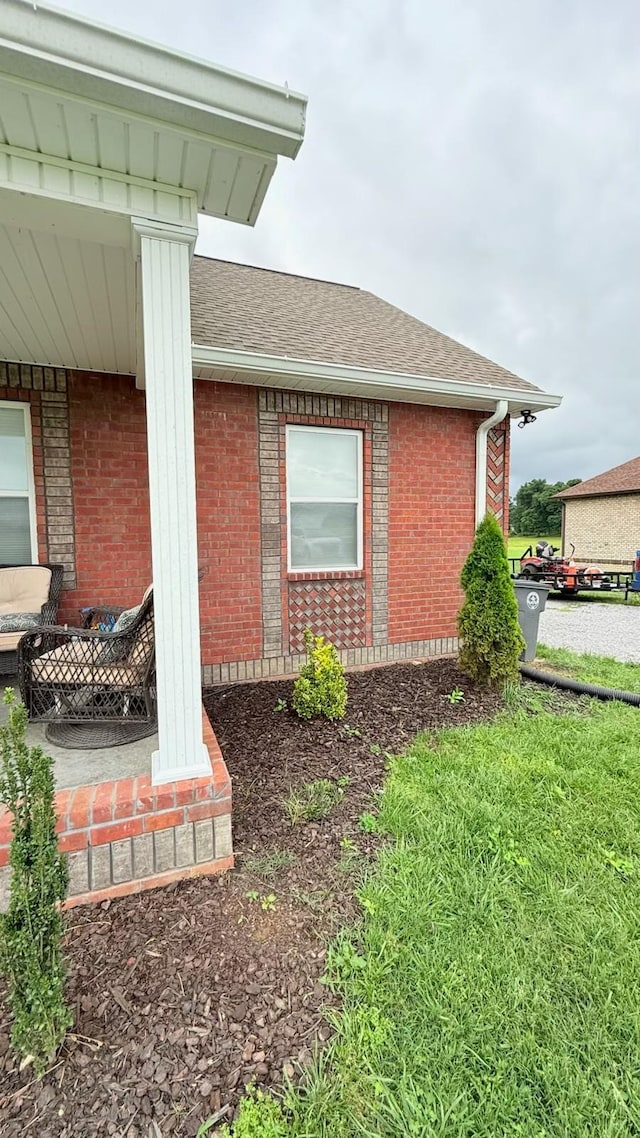 899 Sneed Blvd, Lafayette, TN 37083 - view of home's exterior featuring brick siding and a shingled roof