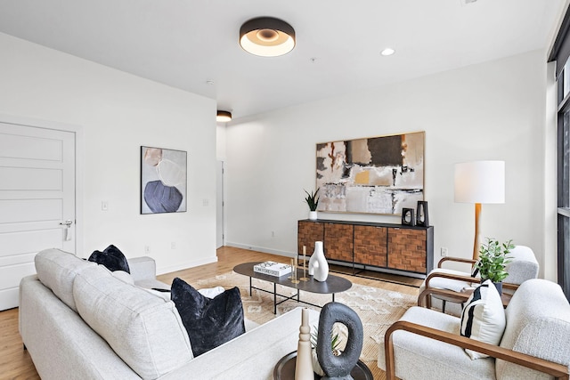 1002 Division St Unit 403, Nashville, TN 37203 - living area featuring light wood-style floors and baseboards